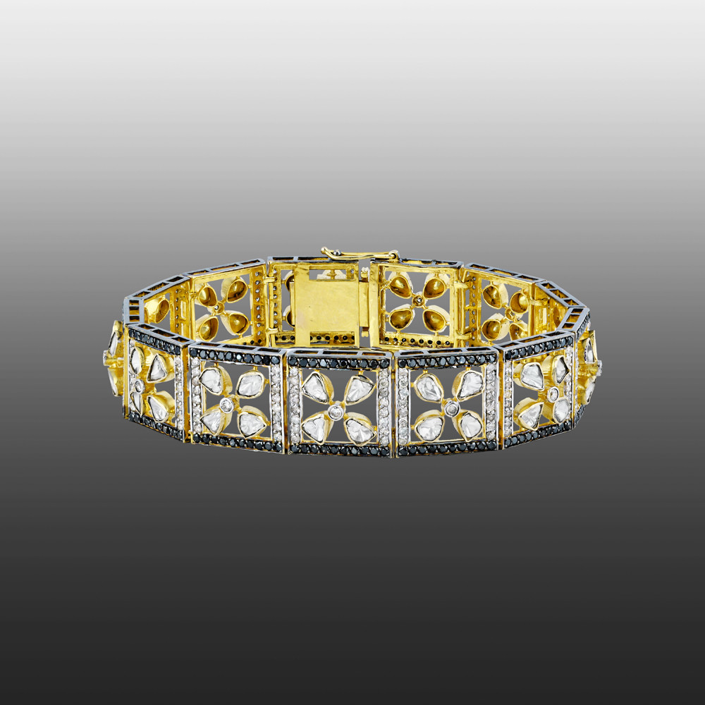 Tennis Bracelet with Floral Polkis and Black Diamond Border